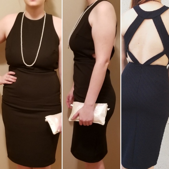 Boutique Dresses & Skirts - HOST PICK! 🎉 High neck Open Back Black Dress